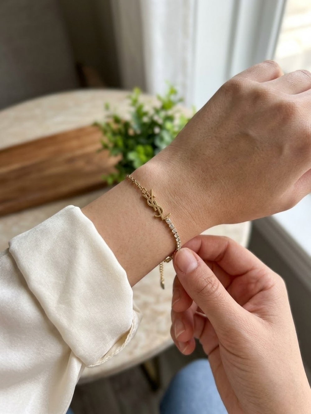 Yves Saint Laurent Gold Logo Bracelet with Crystal Row